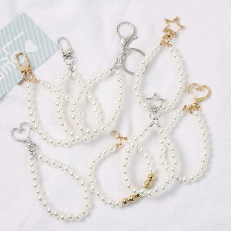 Pearl Key Chain Earphone Case Chain Cute Tassel Cord Pendent Bag Pendant Car Keys Chain Ornaments 
Pearl Key Chain Earphone Case Chain Cute Tassel Cord Pendent Bag Pendant Car Keys Chain Ornaments