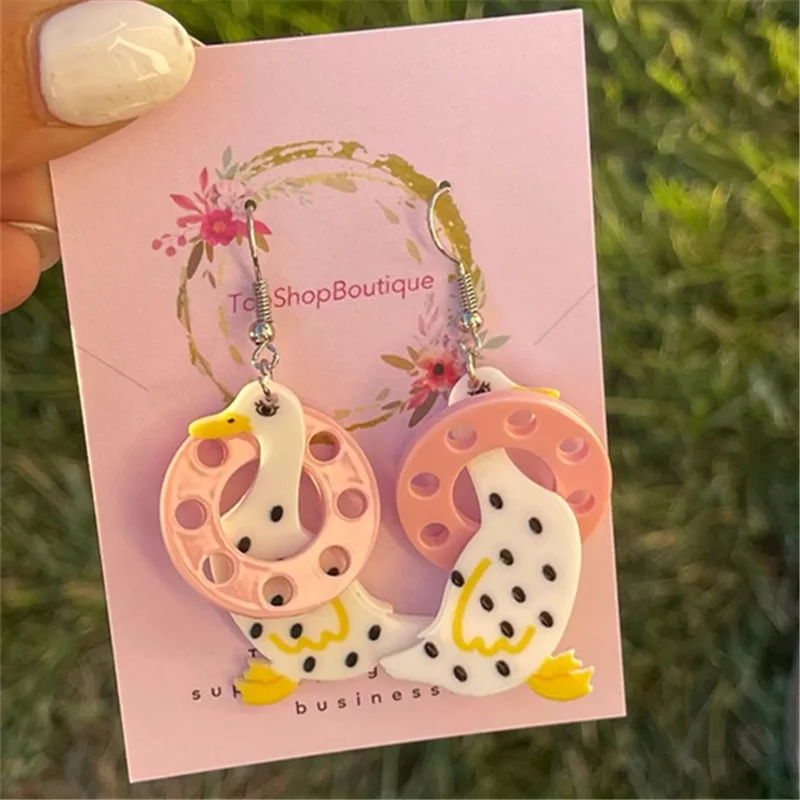 New Cute Cartoon Duck Earrings Have A Swimming Ring on Their Neck, Which Is A Perfect Lovely, Interesting and Strange Earring
New Cute Cartoon Duck Earrings Have A Swimming Ring on Their Neck, Which Is A Perfect Lovely, Interesting and Strange Earring