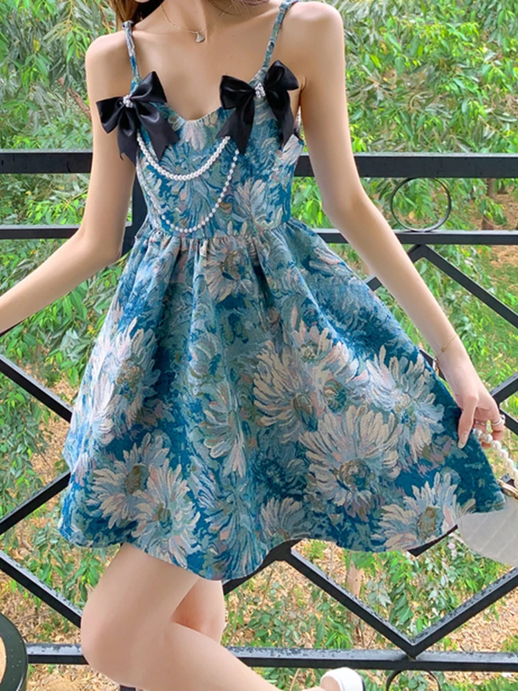 Elegant Sexy Suspender Miniskirt Oil Painting Bow Tutu Skirt 2022 Summer New Korean Fashion Women'S Clothing
Elegant Sexy Suspender Miniskirt Oil Painting Bow Tutu Skirt 2022 Summer New Korean Fashion Women'S Clothing
