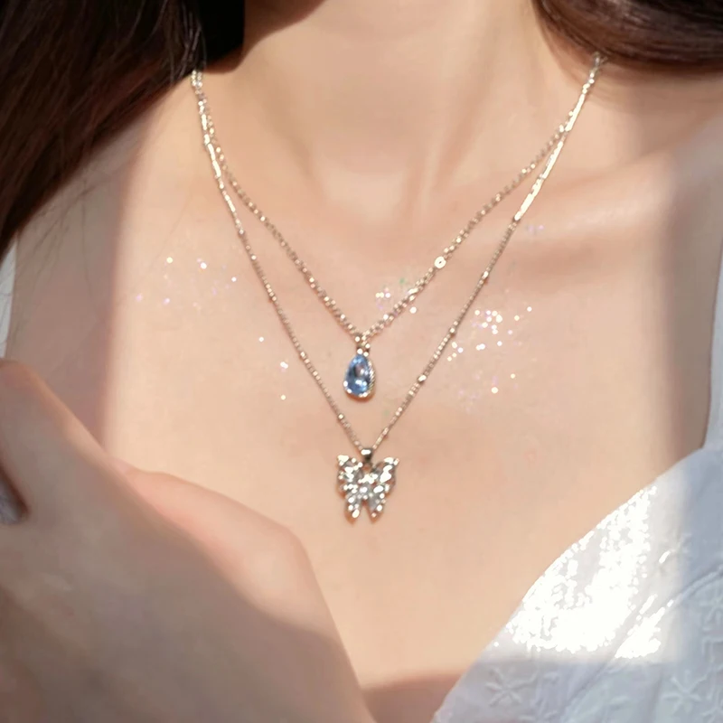 Double Star and Moon Silver Color Necklace Female Blue Gemstone Pendant Necklace Light Luxury Design Niche Clavicle Chain
Double Star and Moon Silver Color Necklace Female Blue Gemstone Pendant Necklace Light Luxury Design Niche Clavicle Chain