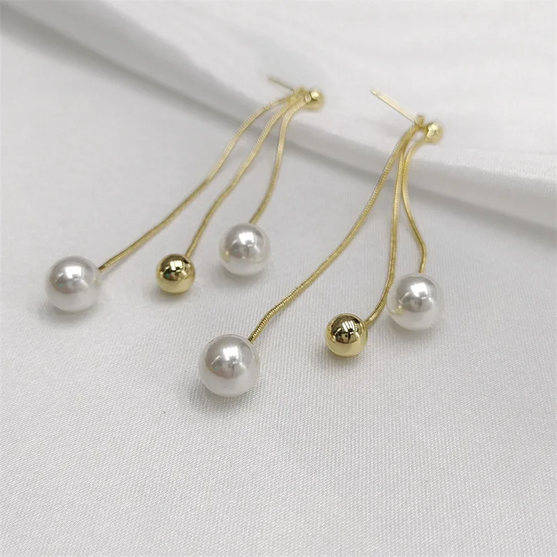 Korean East Gate Simple Temperament Versatile Pearl Gold Ball Long Tassel Earrings Premium Two Wear Earrings Wholesale
Korean East Gate Simple Temperament Versatile Pearl Gold Ball Long Tassel Earrings Premium Two Wear Earrings Wholesale