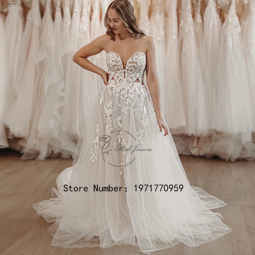 Glitter Sweetheart Ivory Wedding Dresses For Women Princess Strapless Open Back Applique Elegant Bridal Gowns فستان حفلات الزفاف
Glitter Sweetheart Ivory Wedding Dresses For Women Princess Strapless Open Back Applique Elegant Bridal Gowns فستان حفلات الزفاف