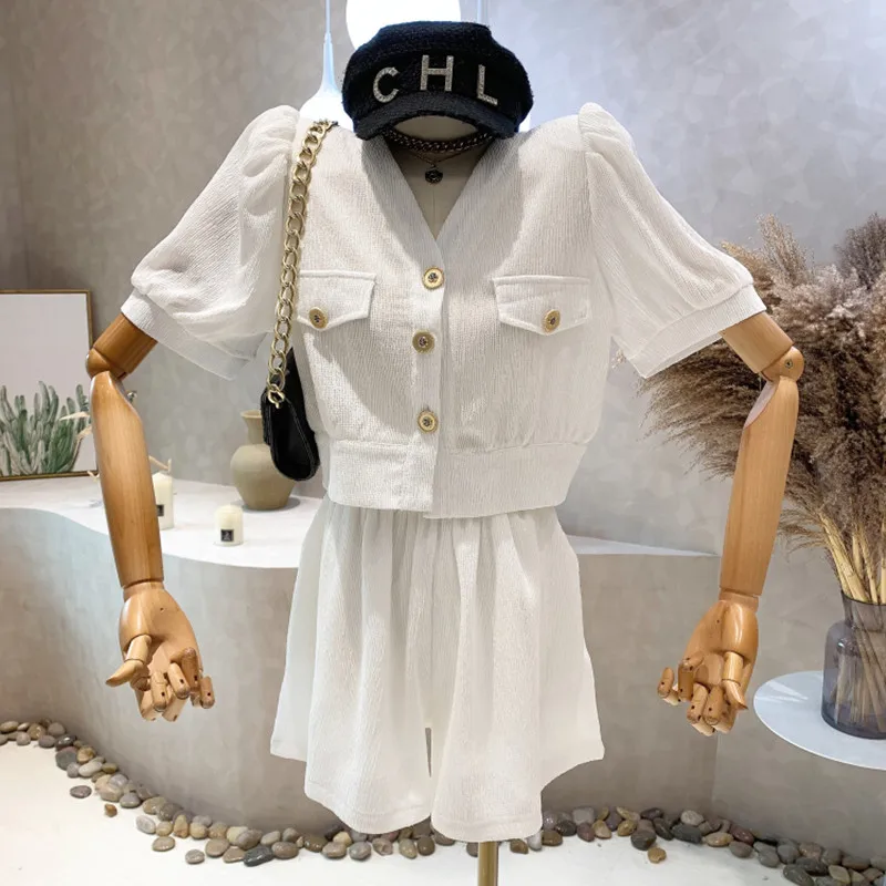 Niche Design New Women's Clothing 2022 Summer Fashion Suit Puff Sleeve Short Top High Waist Wide Leg Shorts Two Piece Set
Niche Design New Women's Clothing 2022 Summer Fashion Suit Puff Sleeve Short Top High Waist Wide Leg Shorts Two Piece Set