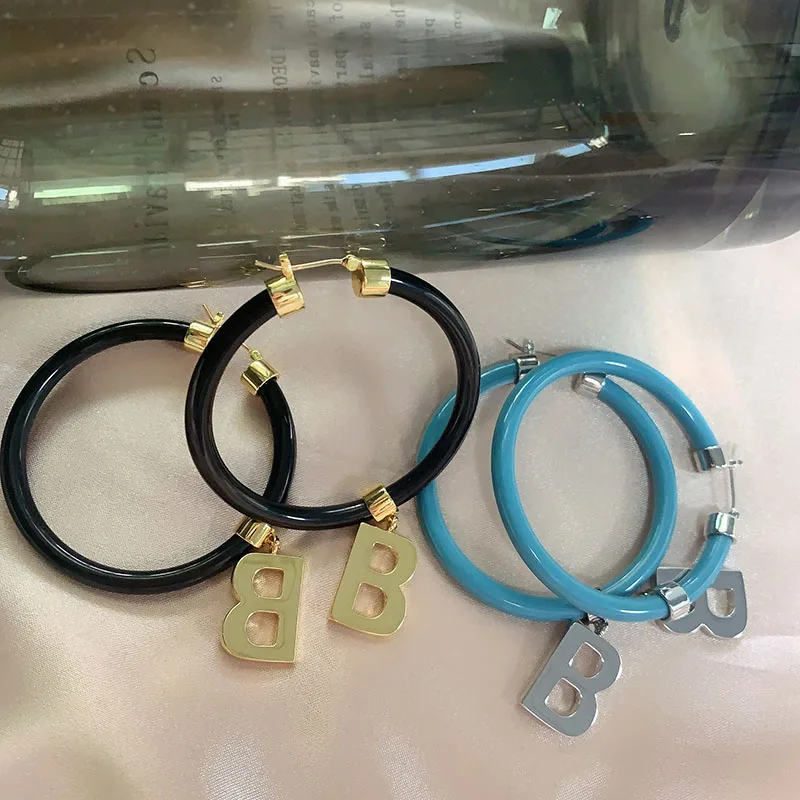 Большие висячие серьги-кольца с буквами B из смолы для женщин, черные, синие массивные серьги, зимняя бижутерия, роскошные дизайнерские укра...
Большие висячие серьги-кольца с буквами B из смолы для женщин, черные, синие массивные серьги, зимняя бижутерия, роскошные дизайнерские укра...