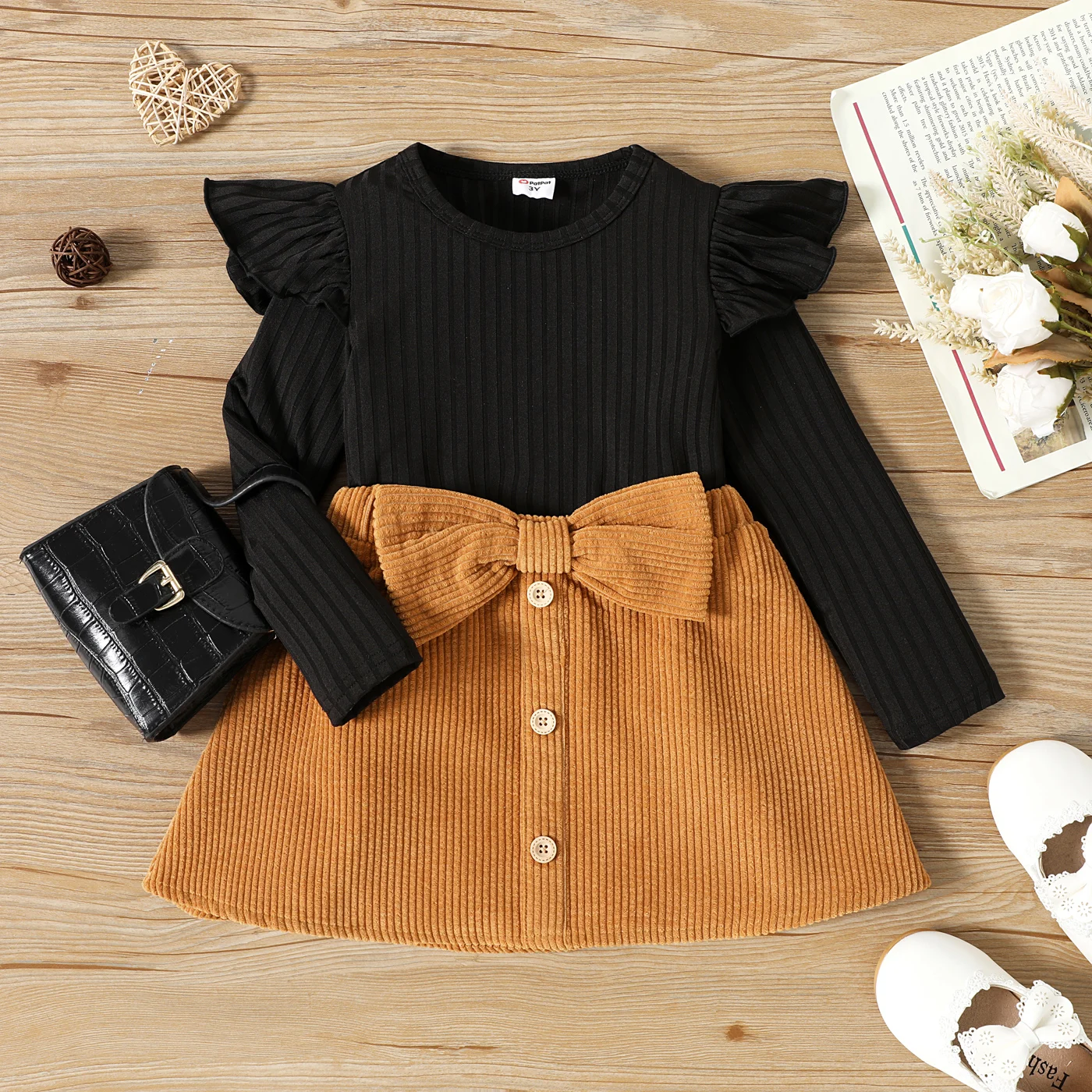 PatPat 2pcs Toddler Girl Ruffled Ribbed Black Tee and Bowknot Button Design Skirt Set
PatPat 2pcs Toddler Girl Ruffled Ribbed Black Tee and Bowknot Button Design Skirt Set