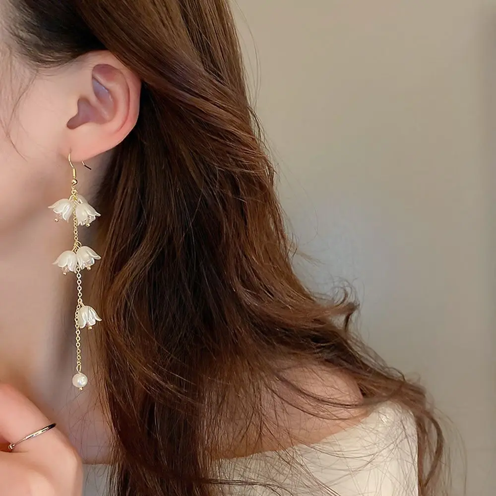Pearl Crystal Bell Orchid Pendant Ear Hook Fresh Earrings for Women Flower Pastoral Design Earrings Girls Jewelry Accessories
Pearl Crystal Bell Orchid Pendant Ear Hook Fresh Earrings for Women Flower Pastoral Design Earrings Girls Jewelry Accessories