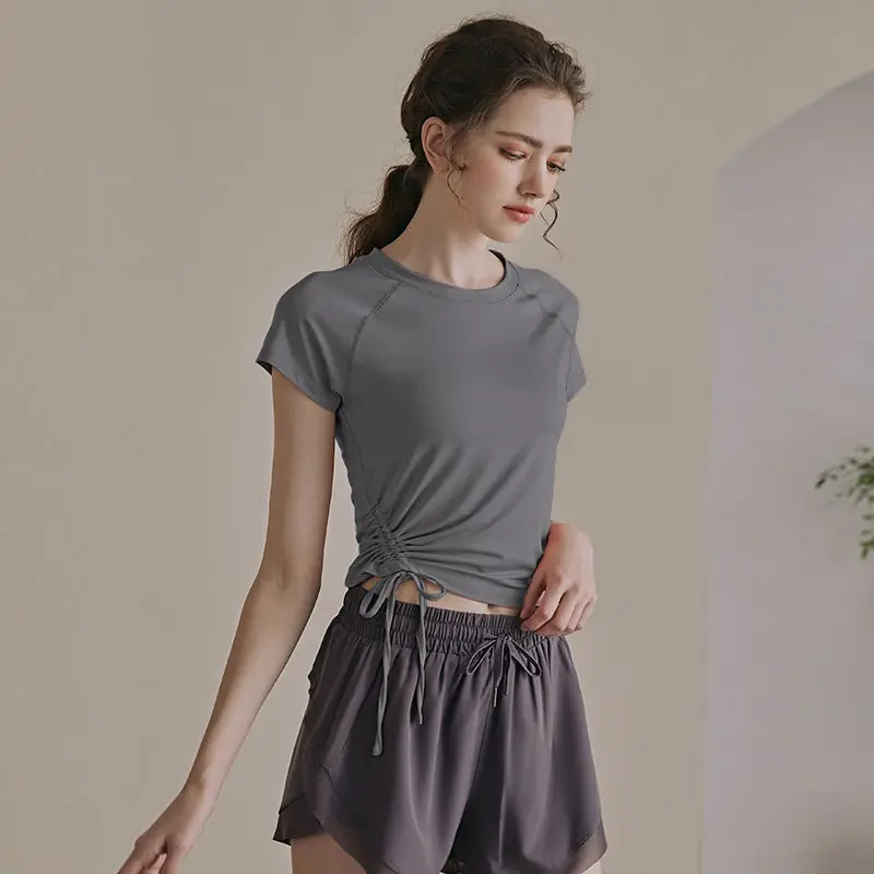 Yoga Clothes Drawstring Sportswear Female Summer Fitness Short-sleeved T-shirt Quick-drying Running Pants Gym Clothing for Women
Yoga Clothes Drawstring Sportswear Female Summer Fitness Short-sleeved T-shirt Quick-drying Running Pants Gym Clothing for Women