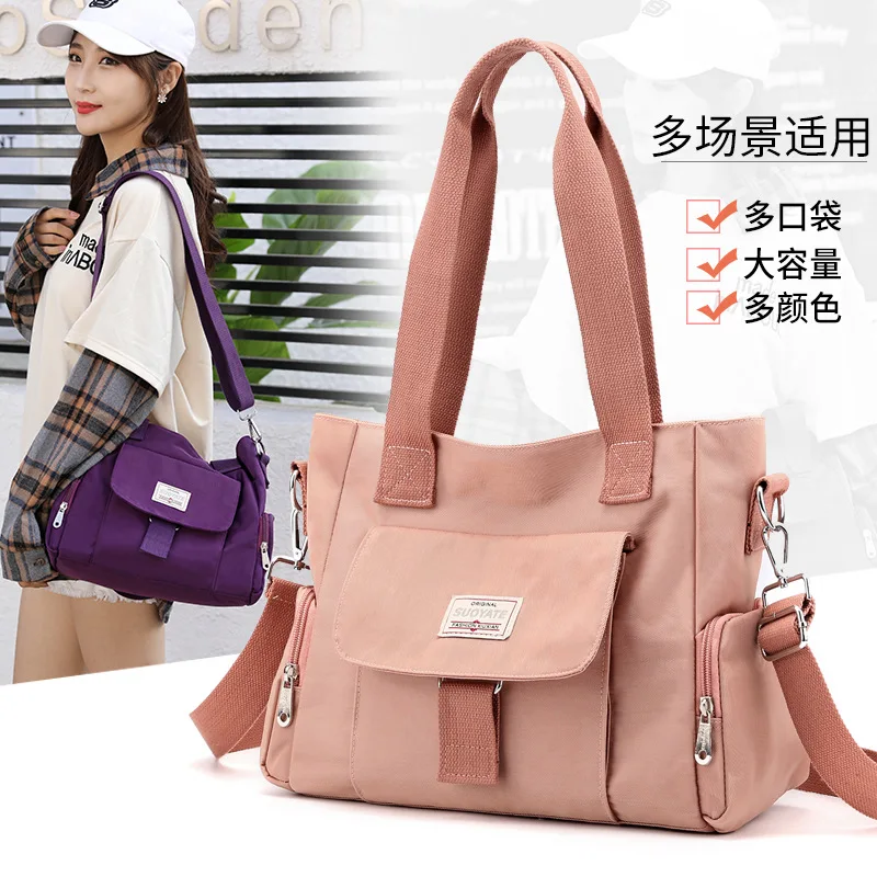 2021 New Women's Handbags Multi-layered Lightweight One-shoulder Messenger Bag Oxford Cloth Large-capacity Women's Handbag
2021 New Women's Handbags Multi-layered Lightweight One-shoulder Messenger Bag Oxford Cloth Large-capacity Women's Handbag