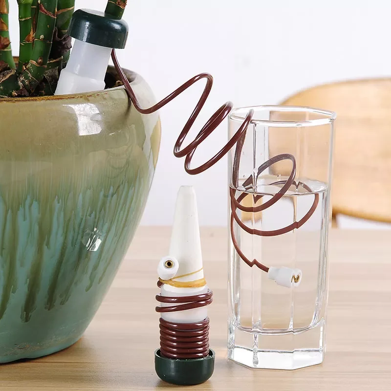 2PCS/lot Home Gardening Automatic Watering Device Flower Pot Irrigation Drip Automatic Watering Device
2PCS/lot Home Gardening Automatic Watering Device Flower Pot Irrigation Drip Automatic Watering Device