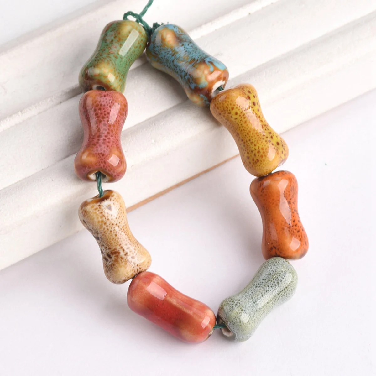 10pcs Bone Shape 18mm Handmade Fancy Glaze Ceramic Porcelain Loose Spacer Beads Lot for Jewelry Making DIY Crafts Findings
10pcs Bone Shape 18mm Handmade Fancy Glaze Ceramic Porcelain Loose Spacer Beads Lot for Jewelry Making DIY Crafts Findings
