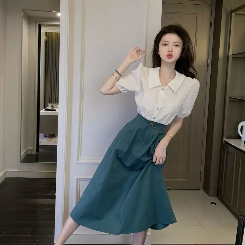 2022 Women Summer Fashion Suits Female Short Sleeve Buttons Blouses and High Waist Loose A-line Skirts Ladies Two Piece Sets N47
2022 Women Summer Fashion Suits Female Short Sleeve Buttons Blouses and High Waist Loose A-line Skirts Ladies Two Piece Sets N47