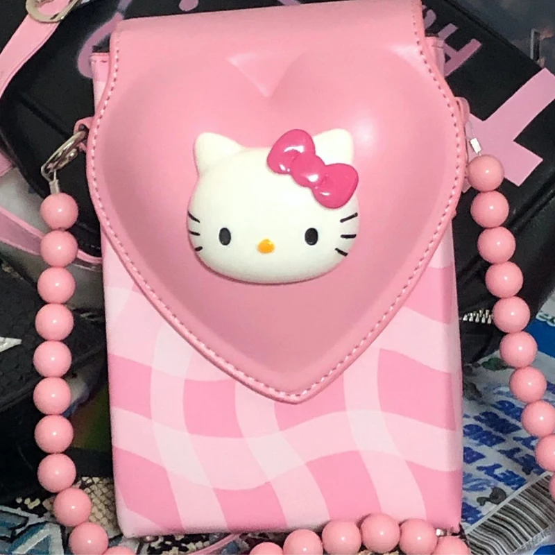 Sanrioed Hellokittys Cartoon Kawaii Pink Checkerboard Messenger Bag Anime Peripherals Creativity Love Kittys Mobile Phone Bag
Sanrioed Hellokittys Cartoon Kawaii Pink Checkerboard Messenger Bag Anime Peripherals Creativity Love Kittys Mobile Phone Bag