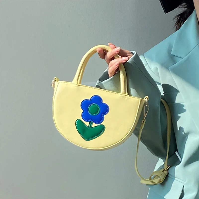 Niche design cream yellow contrast color semicircle flower bag women's 2022 spring and summer new fashion high-end messenger bag
Niche design cream yellow contrast color semicircle flower bag women's 2022 spring and summer new fashion high-end messenger bag