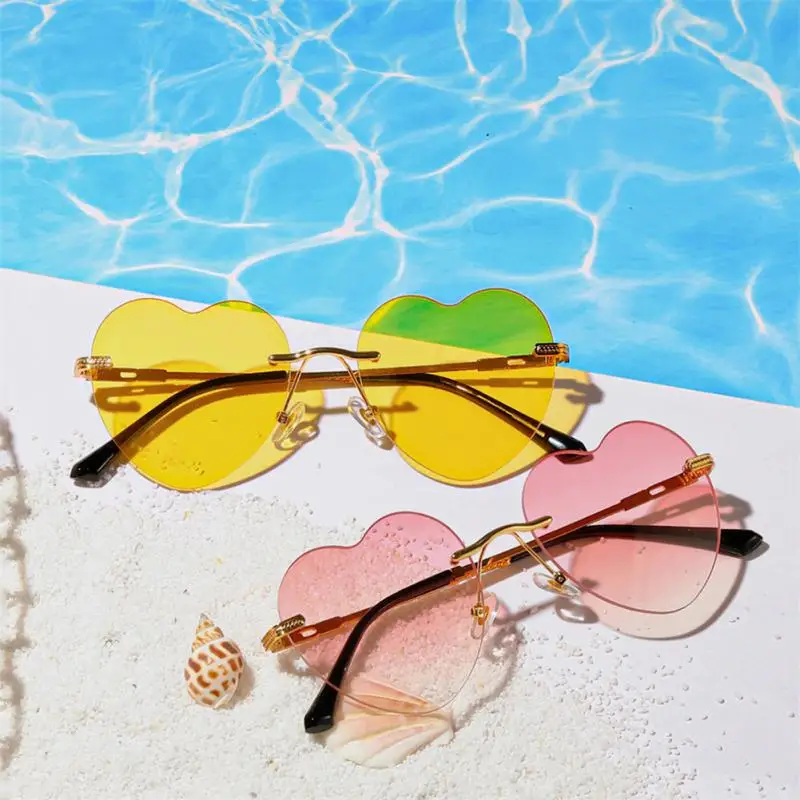 Trendy Sunglasses Rimless Heart-shaped Shaped Glasses Women's Fashion Candy Color Eyewear UV400 Outdoor Sunglasses
Trendy Sunglasses Rimless Heart-shaped Shaped Glasses Women's Fashion Candy Color Eyewear UV400 Outdoor Sunglasses