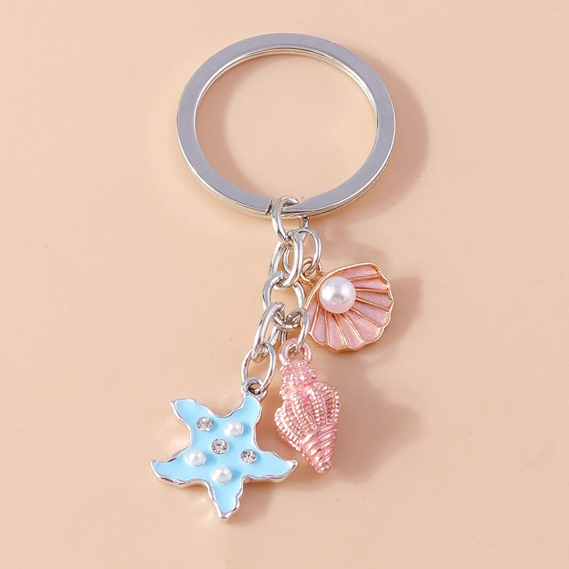 Cute Keychains Enamel Summer Beach Starfish Shell Pendants Keyrings for Women Men Car Key Handbag Pendants Key Chains DIY Gifts
Cute Keychains Enamel Summer Beach Starfish Shell Pendants Keyrings for Women Men Car Key Handbag Pendants Key Chains DIY Gifts