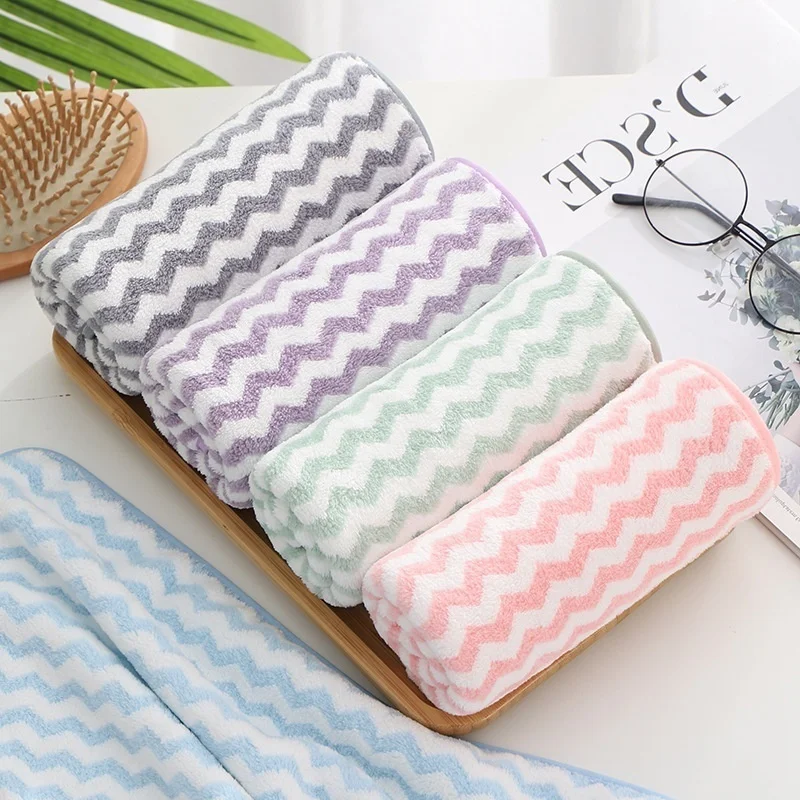 Coral velvet Xinjiang cotton towel thickened pure cotton lint free strong absorbent bath towel five yuan model 
Coral velvet Xinjiang cotton towel thickened pure cotton lint free strong absorbent bath towel five yuan model