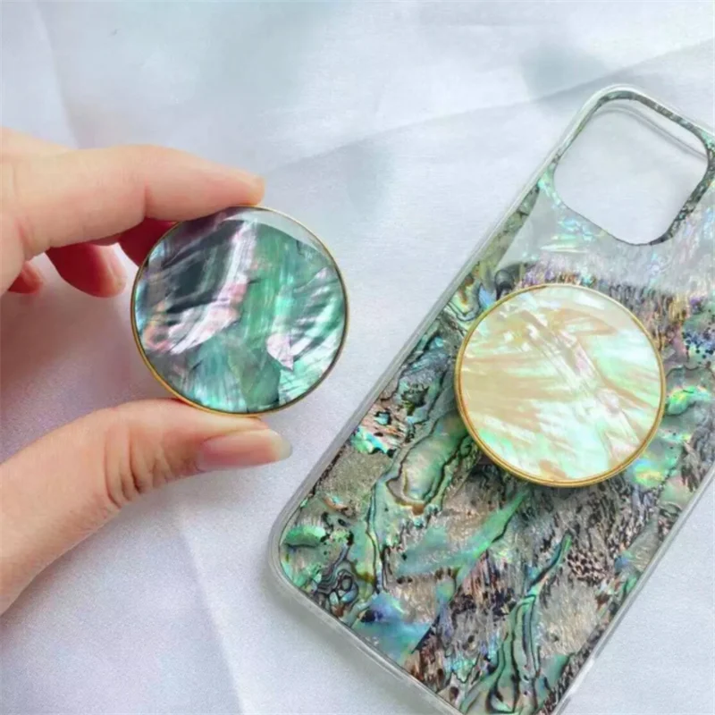 Topper - Natural Mother of Pearl Phone Grip Gold Phone Holder Sea Shell Luxury Smartphone Handles Summer Shiny Smart Toks CR0024
Topper - Natural Mother of Pearl Phone Grip Gold Phone Holder Sea Shell Luxury Smartphone Handles Summer Shiny Smart Toks CR0024