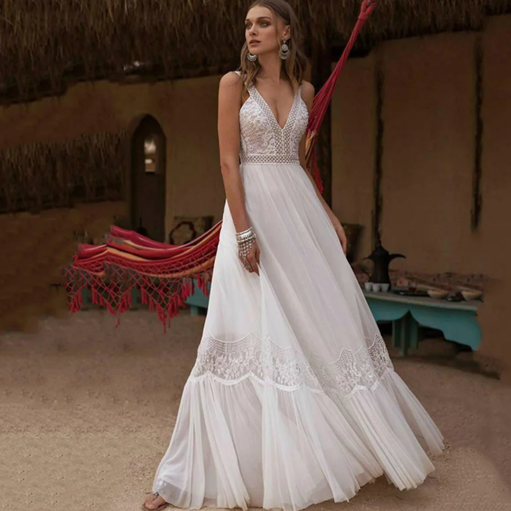 Sexy Boho Wedding Dresses V-Neck Sleeveless Chiffon Dress Summer A-Line Backless Spaghetti Straps Lace Bridal Gowns платье 2022
Sexy Boho Wedding Dresses V-Neck Sleeveless Chiffon Dress Summer A-Line Backless Spaghetti Straps Lace Bridal Gowns платье 2022