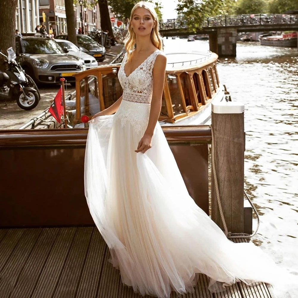 Boho Wedding Dresses V-Neck Cap Sleeves Tulle Dress Vintage A-Line Lace Floor Length Backless Bridal Gowns платье женское 2022
Boho Wedding Dresses V-Neck Cap Sleeves Tulle Dress Vintage A-Line Lace Floor Length Backless Bridal Gowns платье женское 2022