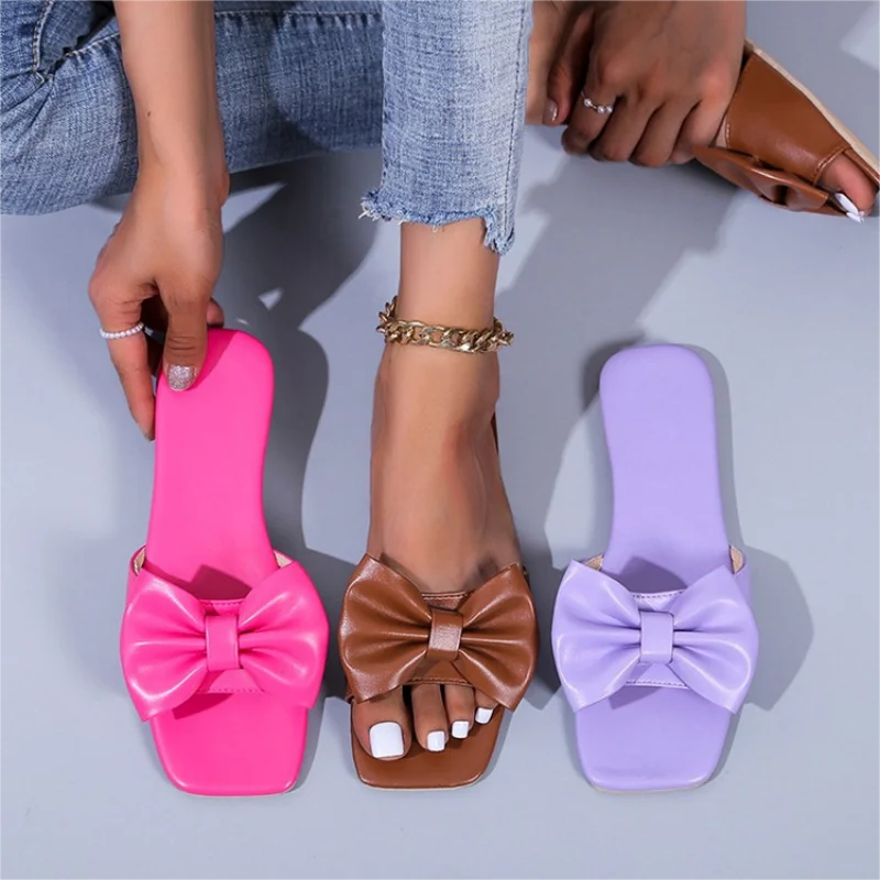 Slides Women Summer New Bow-knot Slippers Fashion Flat Large Size Candy Colors Sandals Female Sexy Casual Outdoor Beach Shoes
Slides Women Summer New Bow-knot Slippers Fashion Flat Large Size Candy Colors Sandals Female Sexy Casual Outdoor Beach Shoes