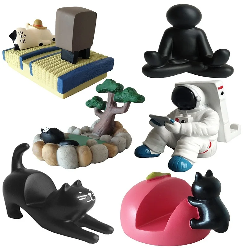 Creative Grocery Astronaut Mobile Phone Notebook Stand Tatami Hot Spring Cat Stretch Resin Craft Ornament 
Creative Grocery Astronaut Mobile Phone Notebook Stand Tatami Hot Spring Cat Stretch Resin Craft Ornament