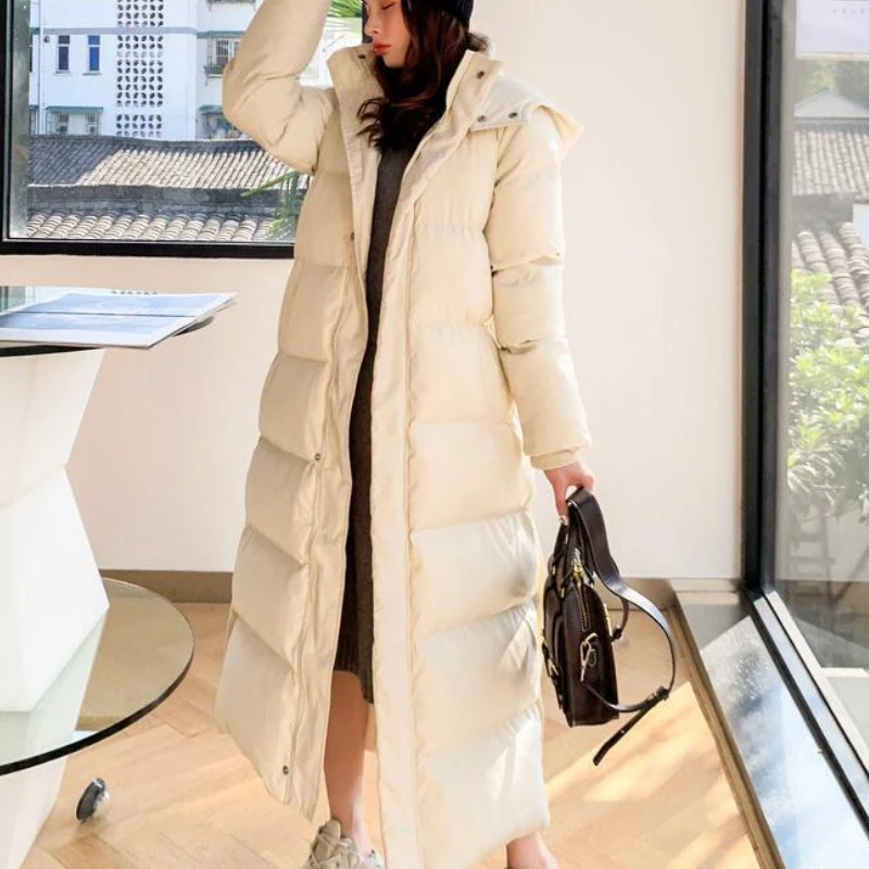 Winter New Women Long Over-the-knee Hooded Down Jacket Design Solid Color Plus Velvet Warm Black Coats Elegant Female Clothing
Winter New Women Long Over-the-knee Hooded Down Jacket Design Solid Color Plus Velvet Warm Black Coats Elegant Female Clothing