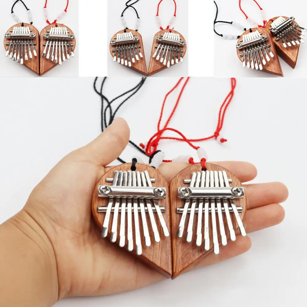 Heart Shape Kalimba Thumb Piano Multi-tones Mini Finger Piano Wearable Powerful For Adult Kids Mahogany Wood Thumb Piano
Heart Shape Kalimba Thumb Piano Multi-tones Mini Finger Piano Wearable Powerful For Adult Kids Mahogany Wood Thumb Piano