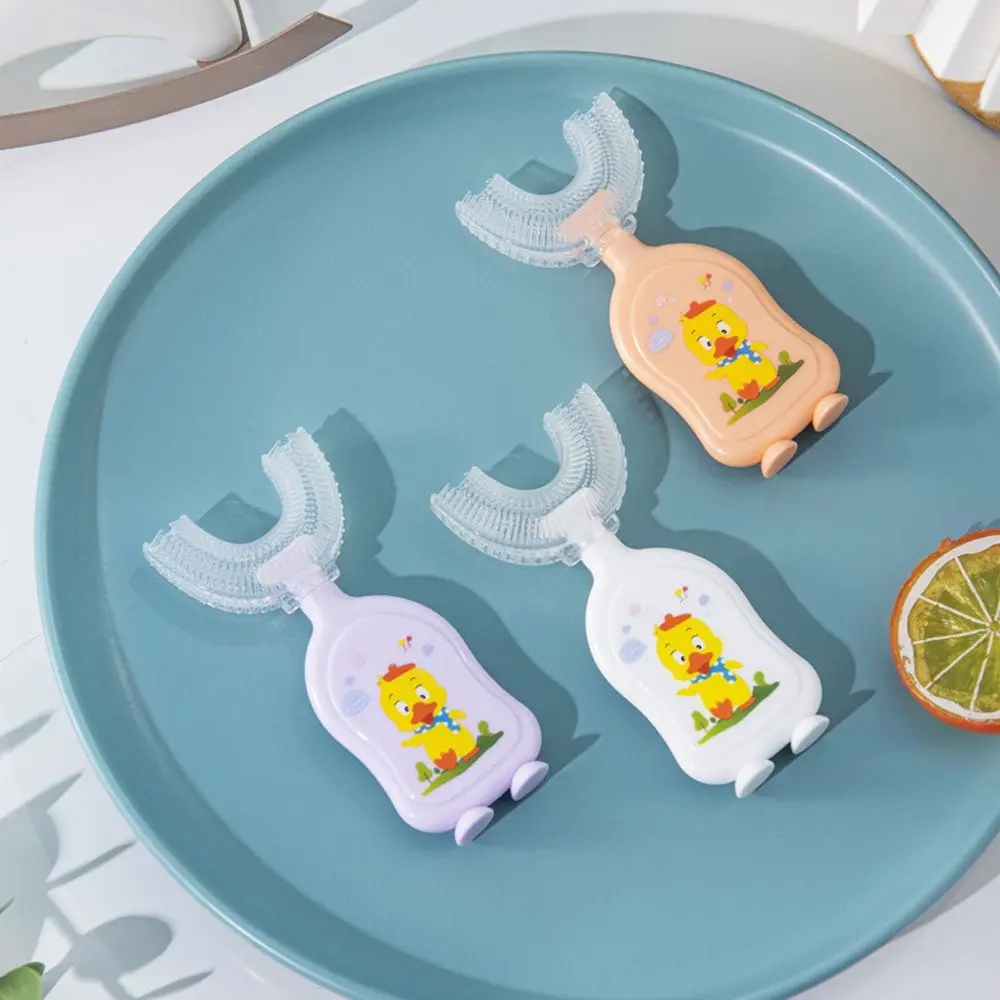 2-13 Year Old Baby's New Cute Bear Duck Mouth Containing Type Manual U-Shaped 360 Degree Cleaning Massage Silicone Toothbrush
2-13 Year Old Baby's New Cute Bear Duck Mouth Containing Type Manual U-Shaped 360 Degree Cleaning Massage Silicone Toothbrush