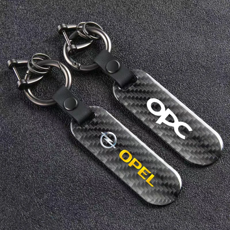 Новинка модный автомобильный брелок из углеродного волокна и кожи брелок для Opel OPC H G J Corsa Insignia Astra Antara автомобильные аксессуары
Новинка модный автомобильный брелок из углеродного волокна и кожи брелок для Opel OPC H G J Corsa Insignia Astra Antara автомобильные аксессуары