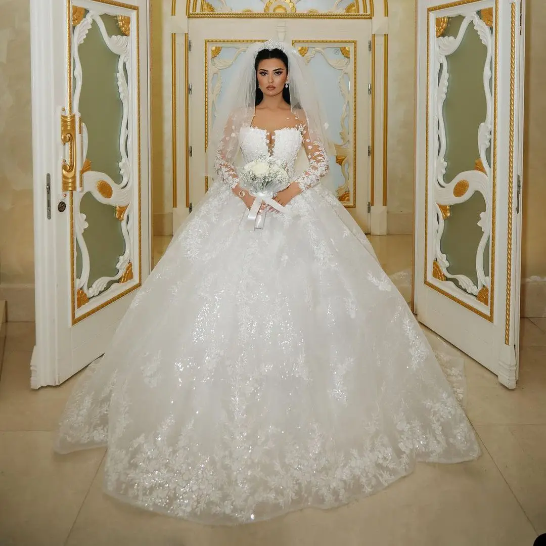 Luxury White Wedding Dresses Sheer Neck Sparkly Glitter Sequins Long Sleeves Lace Applique Elegant Bridal Gowns Vestido De Novia
Luxury White Wedding Dresses Sheer Neck Sparkly Glitter Sequins Long Sleeves Lace Applique Elegant Bridal Gowns Vestido De Novia