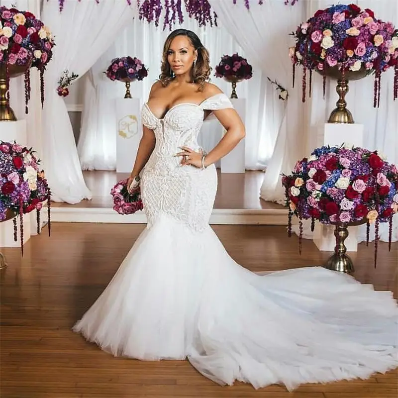 African Mermaid Wedding Dress Bridal Gowns Plus Size Off The Shoulder Lace Appliqued Beaded vestido de noiva Lady Marriage Dress
African Mermaid Wedding Dress Bridal Gowns Plus Size Off The Shoulder Lace Appliqued Beaded vestido de noiva Lady Marriage Dress