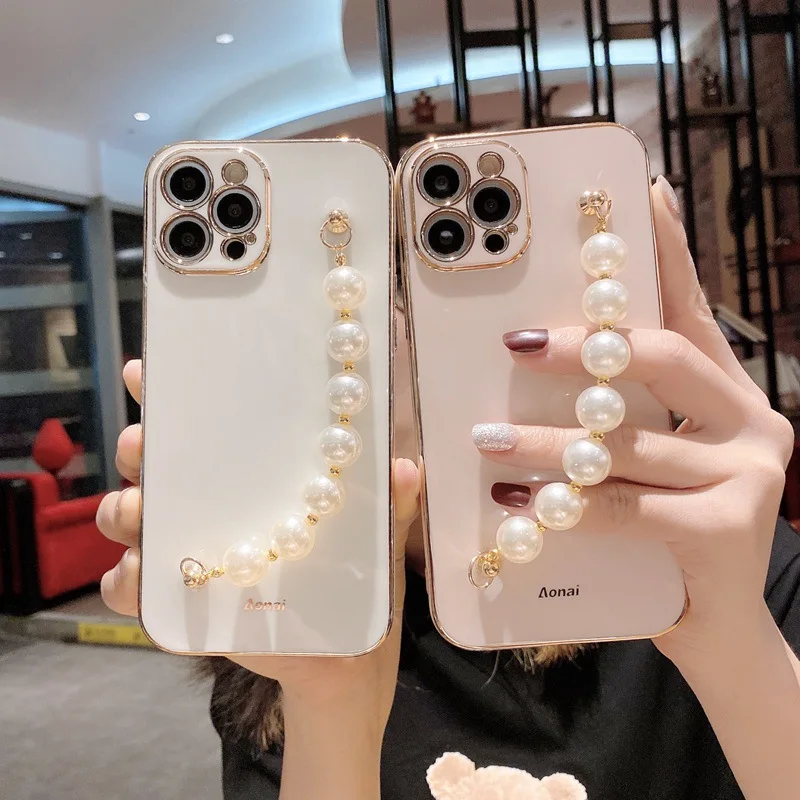 Pearl Rhinestone Wrist Strap Chain Phone Case for Women Girls, Soft TPU Shockproof Drop Protection Cover for iPhone
Pearl Rhinestone Wrist Strap Chain Phone Case for Women Girls, Soft TPU Shockproof Drop Protection Cover for iPhone