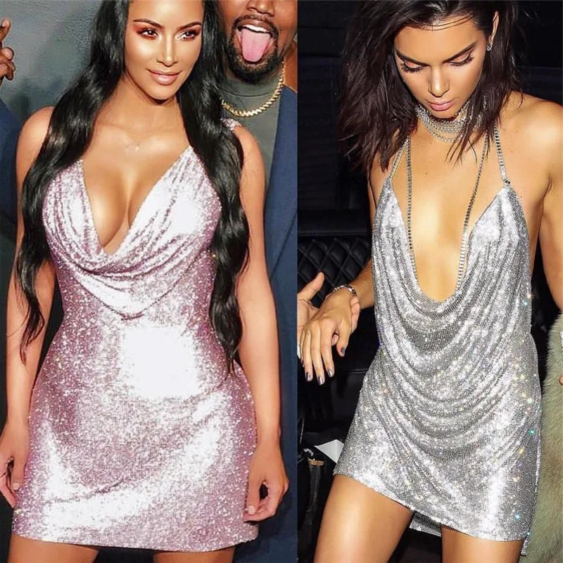 2023 Sexy Gold Sequined Patchwork Mini Dress Women Sleeveless Low Cut Metal Chains Halter Slim Charming Nightclub Party Dresses
2023 Sexy Gold Sequined Patchwork Mini Dress Women Sleeveless Low Cut Metal Chains Halter Slim Charming Nightclub Party Dresses