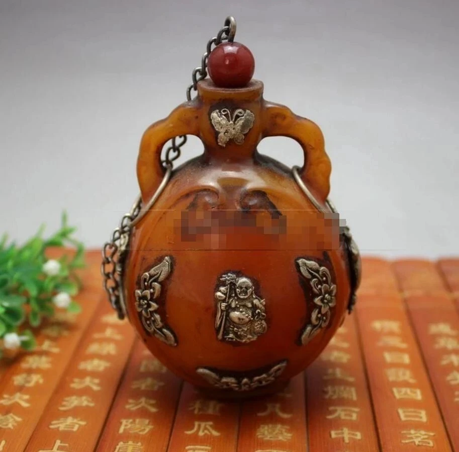Copper Statue Antique bag silver inlaid with yellow wax snuff bottle 
Copper Statue Antique bag silver inlaid with yellow wax snuff bottle