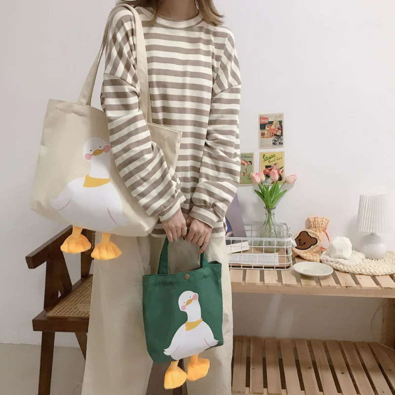 2023 Fashion New Cartoon Tote Handbag Women's Canvas Bag Cute Duck Large-capacity Handbag Women Bag Shoulder Bag Shopping Bag
2023 Fashion New Cartoon Tote Handbag Women's Canvas Bag Cute Duck Large-capacity Handbag Women Bag Shoulder Bag Shopping Bag