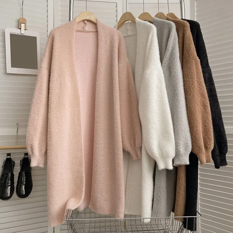 2023 Solid Color Lady V-neck knitted Cardigans Spring New Women Korean Loose Imitation mink Long Cardigan Sweater Jacket Coat
2023 Solid Color Lady V-neck knitted Cardigans Spring New Women Korean Loose Imitation mink Long Cardigan Sweater Jacket Coat