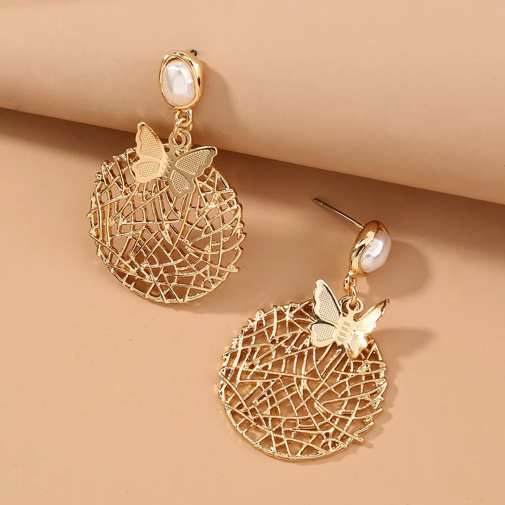 European and American fashion exaggerated hollow metal butterfly pearl earrings personality retro design earrings earrings
European and American fashion exaggerated hollow metal butterfly pearl earrings personality retro design earrings earrings