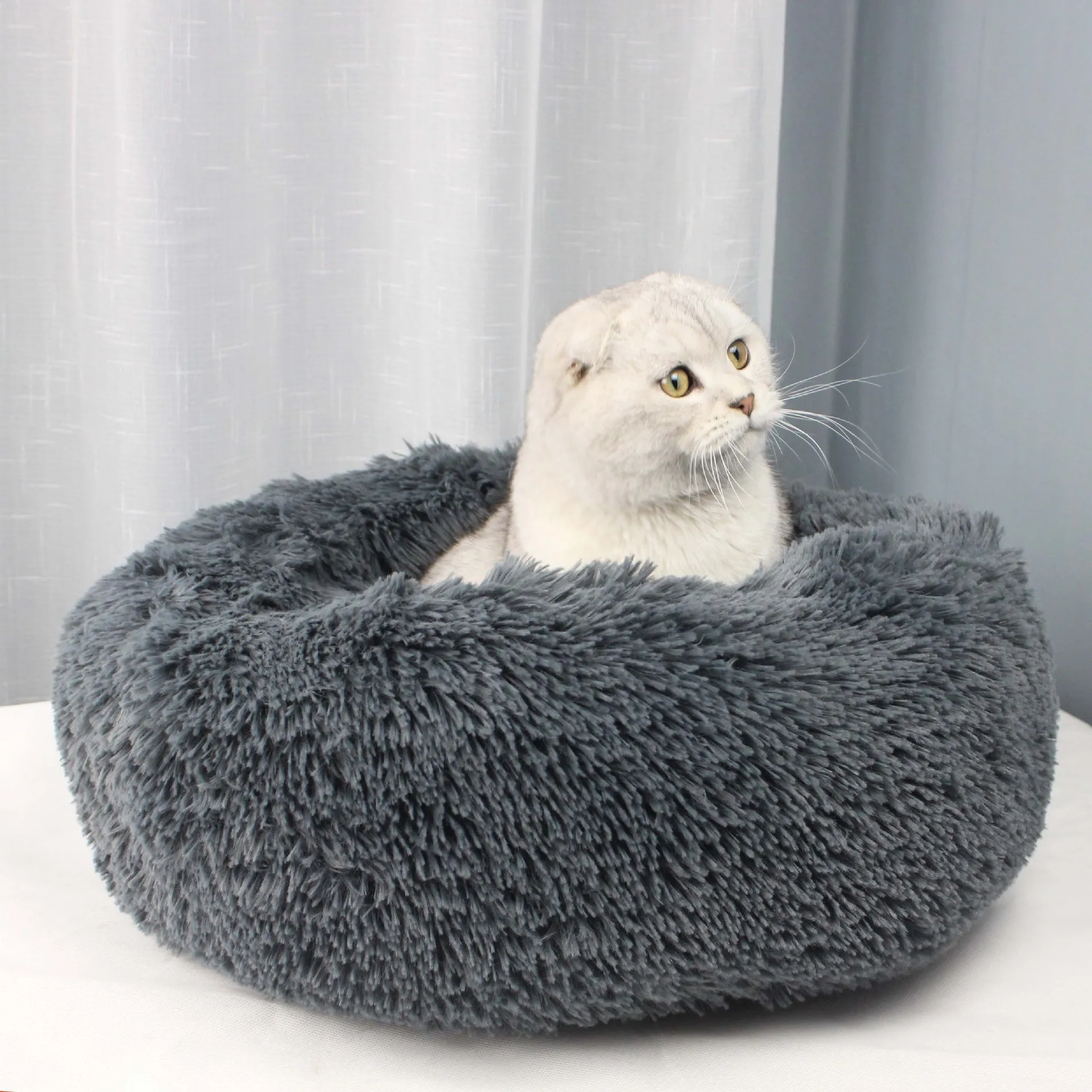 Autumn and winter thick plush round pet nest mat for deep sleep cat nest kennel new home
Autumn and winter thick plush round pet nest mat for deep sleep cat nest kennel new home