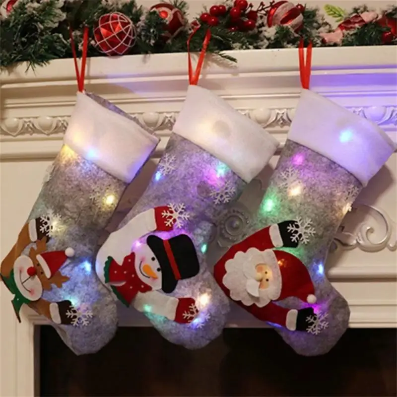 

Рождественские Чулки со светодиодсветильник кой, украшение для рождественской елки, камина, детский Подарочный мешок для конфет, подвесные карманные носки с Санта-Клаусом, снеговиком, оленем