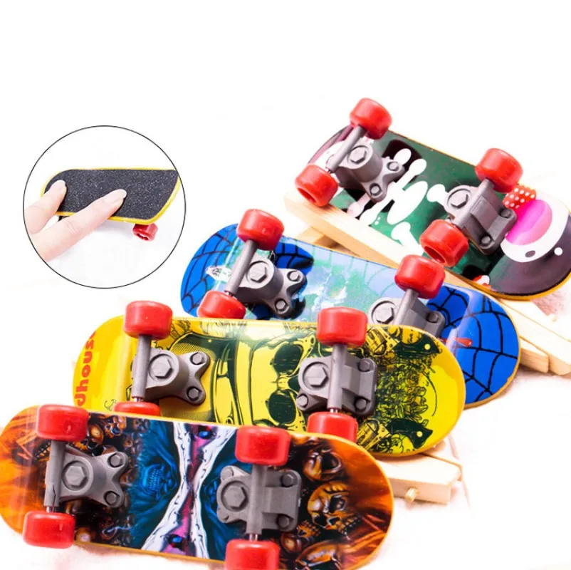 Random Funny Mini Finger Skateboard Toys Learn Skateboarding Model Professional Alloy Stand FingerBoard Kid Toys Sport Game Gift
Random Funny Mini Finger Skateboard Toys Learn Skateboarding Model Professional Alloy Stand FingerBoard Kid Toys Sport Game Gift