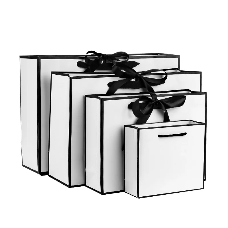 Wholesale 500pcs/lot Custom Design Clothing White Cardboard Shopping Paper Bag with Ribbon Handle
Wholesale 500pcs/lot Custom Design Clothing White Cardboard Shopping Paper Bag with Ribbon Handle