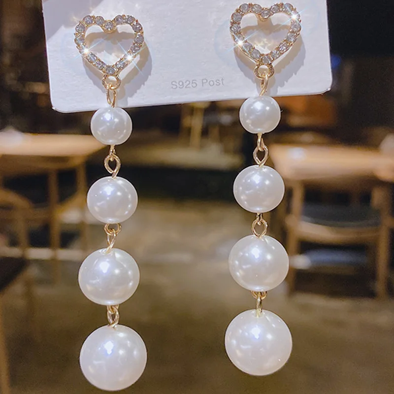 Love Women Pearl Stud Earrings Pendant White Tassel Earrings Korean Street Trend Metal Elegant Accessories Luxury Diamonds 2022
Love Women Pearl Stud Earrings Pendant White Tassel Earrings Korean Street Trend Metal Elegant Accessories Luxury Diamonds 2022