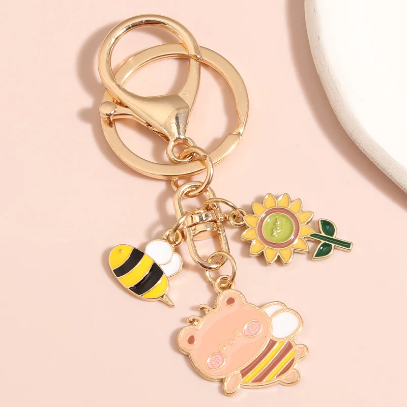 Cartoon Enamel Keychain Honeybee Sunflower Bear Key Ring Animal Key Chains For Women Men Handbag Accessorie DIY Jewelry Gifts
Cartoon Enamel Keychain Honeybee Sunflower Bear Key Ring Animal Key Chains For Women Men Handbag Accessorie DIY Jewelry Gifts