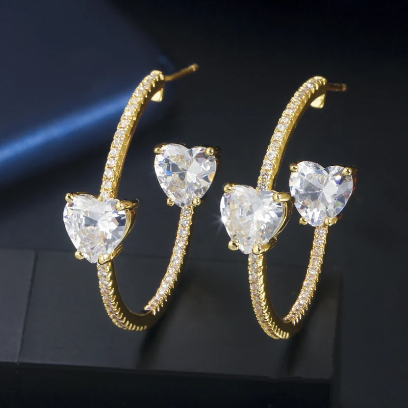 ThreeGraces Shiny Love Heart Shape Cubic Zirconia Gold Color Hoop Earrings for Women New Trendy Punk Party Jewelry Gift ER790
ThreeGraces Shiny Love Heart Shape Cubic Zirconia Gold Color Hoop Earrings for Women New Trendy Punk Party Jewelry Gift ER790