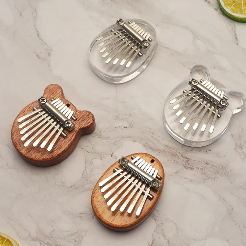 8 Key Mini Kalimba Thumb Piano Wood Metals Small Musical Instrument Pendant Gift for Adult Kids Beginner Learning
8 Key Mini Kalimba Thumb Piano Wood Metals Small Musical Instrument Pendant Gift for Adult Kids Beginner Learning