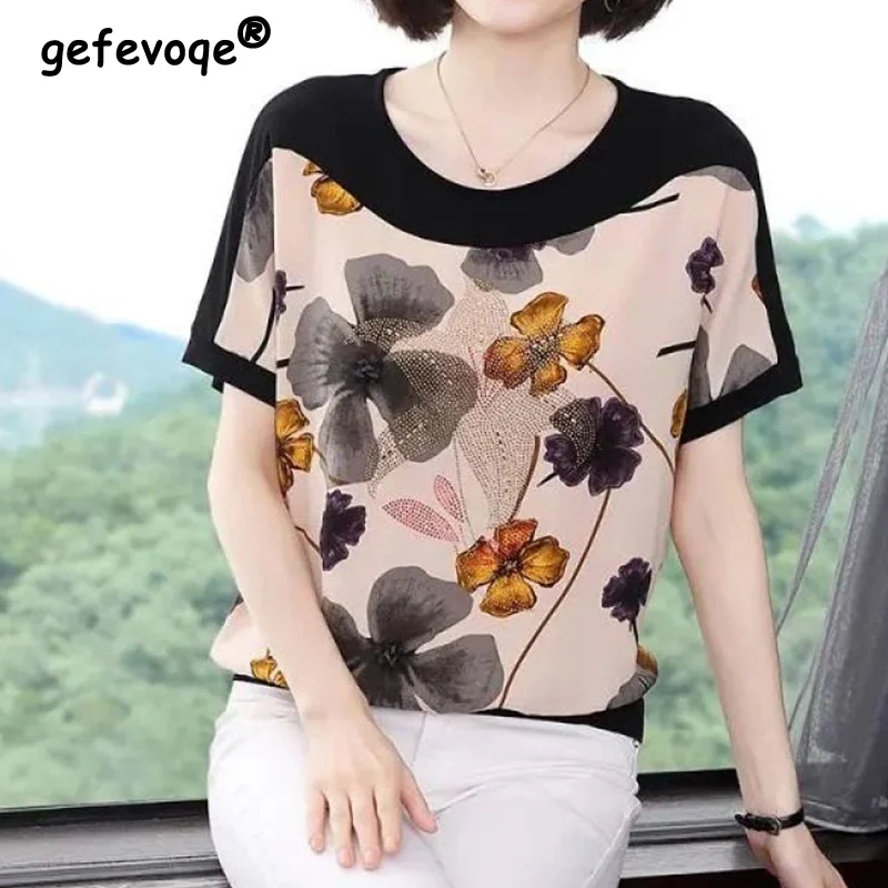 Elegant Fashion Casual Floral Printed Diamonds T-shirt Summer 2022 New Streetwear Short Sleeve O-Neck Loose Tops Female Clothing
Elegant Fashion Casual Floral Printed Diamonds T-shirt Summer 2022 New Streetwear Short Sleeve O-Neck Loose Tops Female Clothing