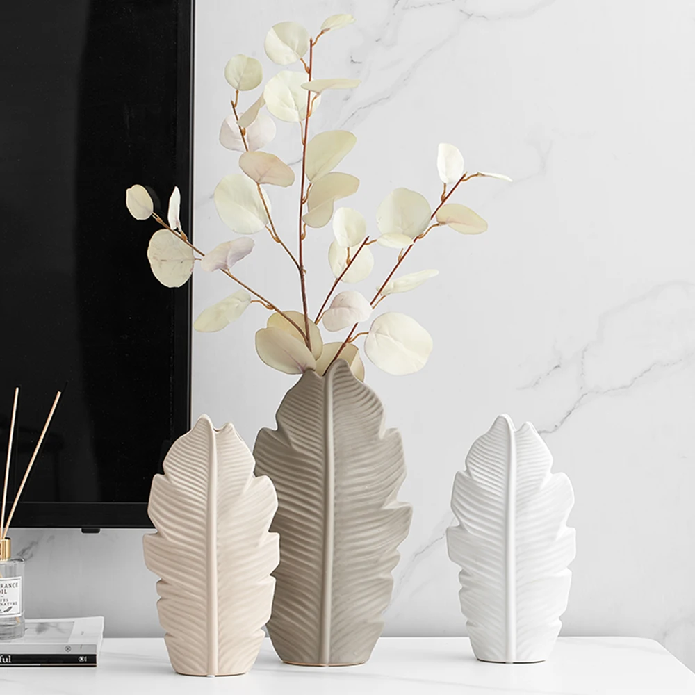 Ceramic Vase Leaves Model Modern Home Decor White Vases Art Living Room Decoration Center Table Decoration Wedding Accessories
Ceramic Vase Leaves Model Modern Home Decor White Vases Art Living Room Decoration Center Table Decoration Wedding Accessories