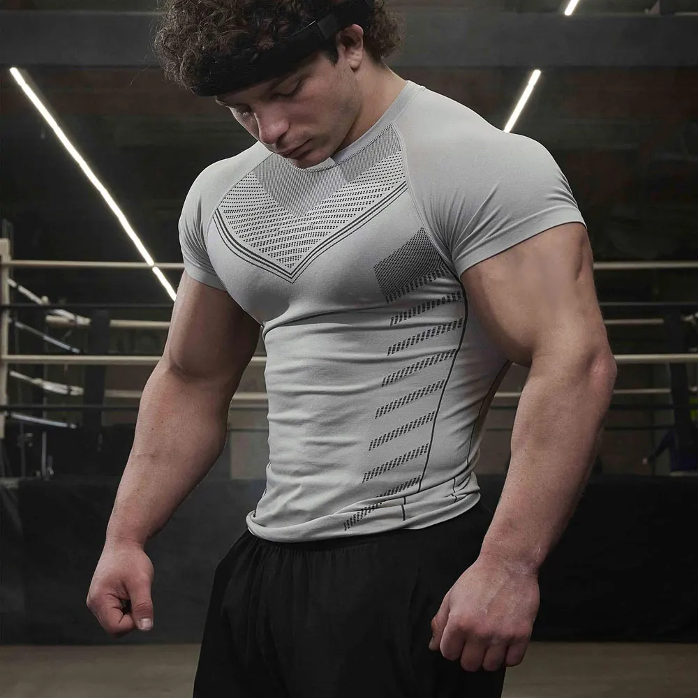 

Men Gym T-shirt Sports Running Fitness Compression Quick Dry Short Sleeve Tee Shirt Male High Elasticity Bodybuilding Tight Tops