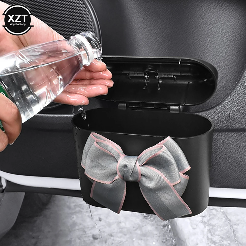 Cute Bowknot Car Trash Bin Hanging Vehicle Garbage Dust Case Storage Box Pressing Type Auto Rubbish Can Car Interior Accessories
Cute Bowknot Car Trash Bin Hanging Vehicle Garbage Dust Case Storage Box Pressing Type Auto Rubbish Can Car Interior Accessories