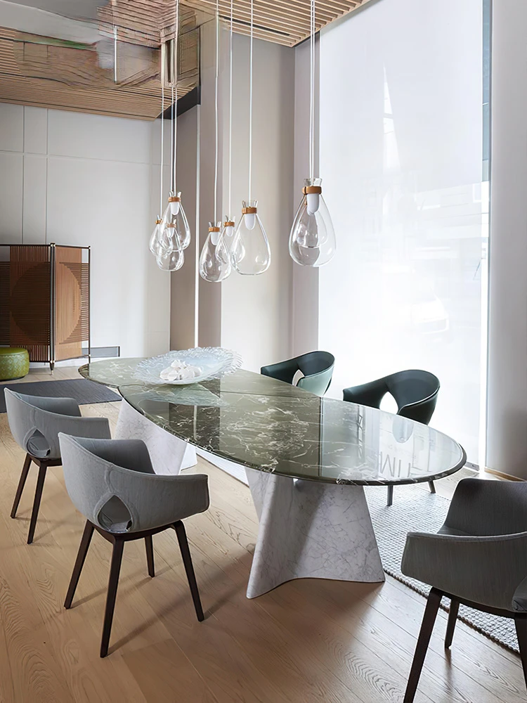 Light and extravagant marble dining table living room high-end Italian very simple dining table and chair combination 
Light and extravagant marble dining table living room high-end Italian very simple dining table and chair combination